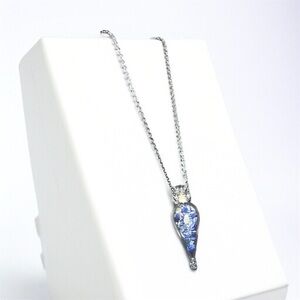 Elegant Silver Necklace With Lapis Lazuli Crystal Chips Inside Pendant